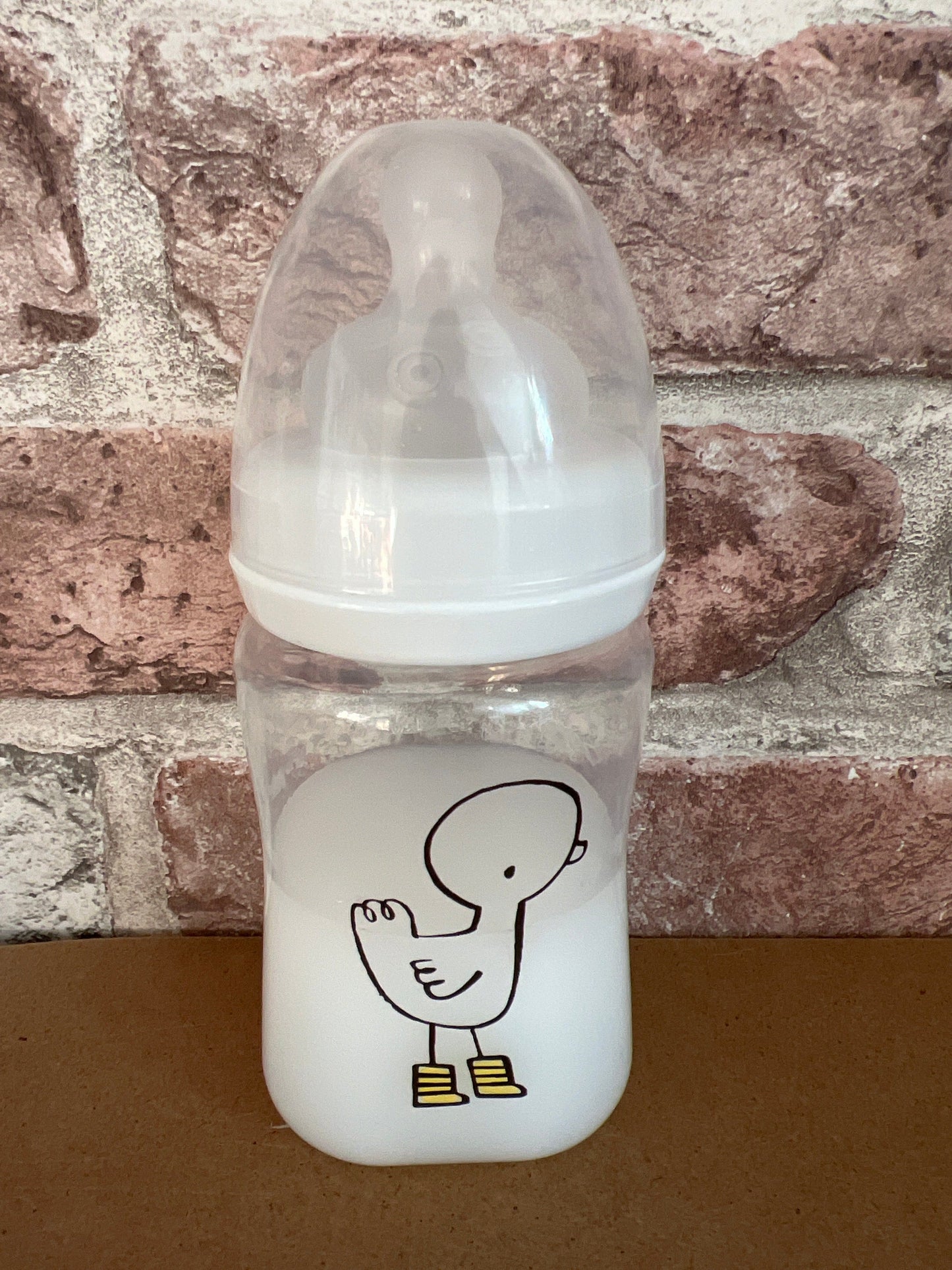BPA-free silicone bottle with a cartoon character on a stone surface willow tree reborns UK